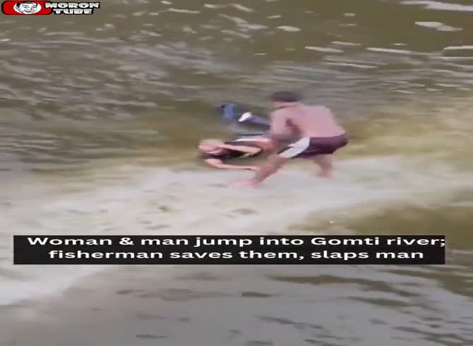 Video :A suicidal guy is saved by a fisherman who smacks him across the face
